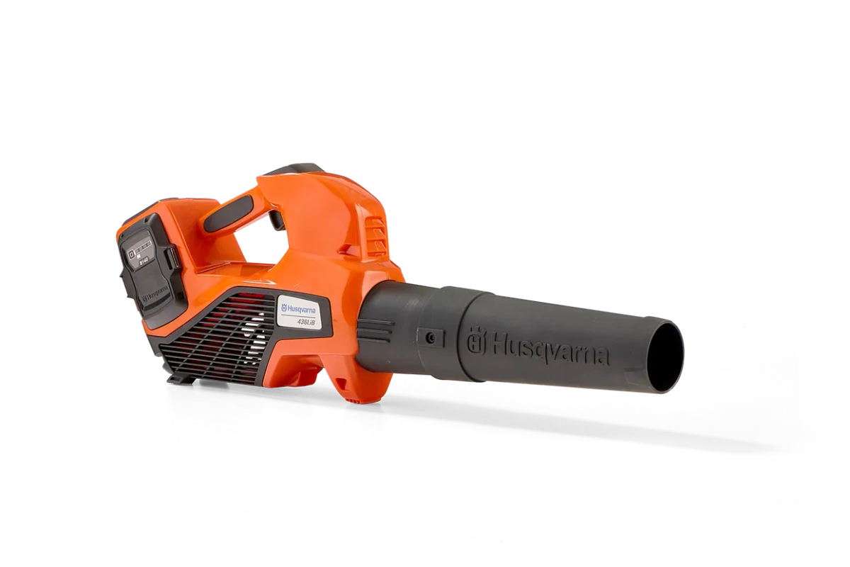 Zabawka dmuchawa Husqvarna 125 B wydaje dźwięk i dmucha powietrzem